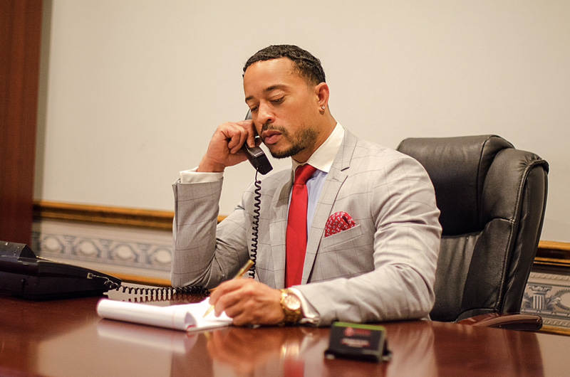 Attorney Kris M. Nevels listening on the phone.